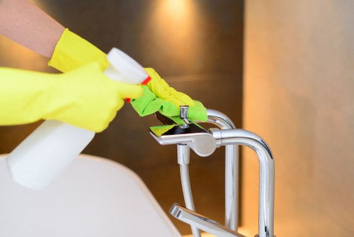 Cleaner restoring a carpet in a Bermondsey office space